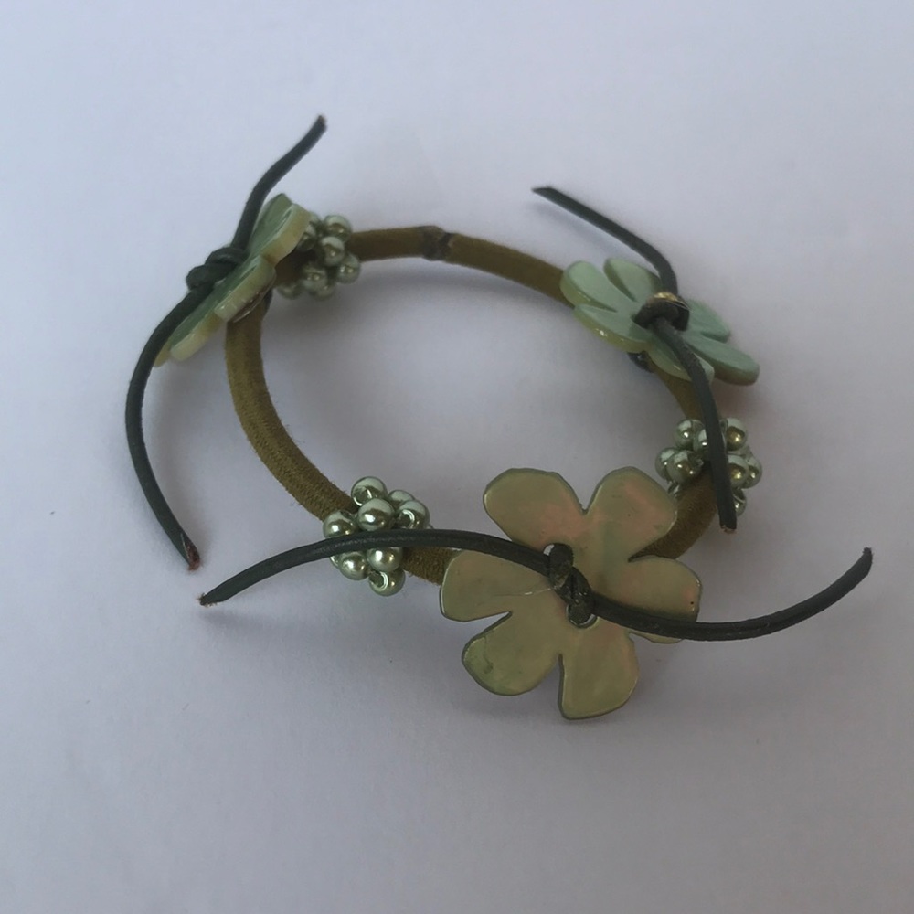 Jane Tran green pony tail holder